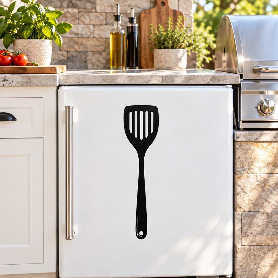 Spatula wall decal, black spatula silhouette on a white surface