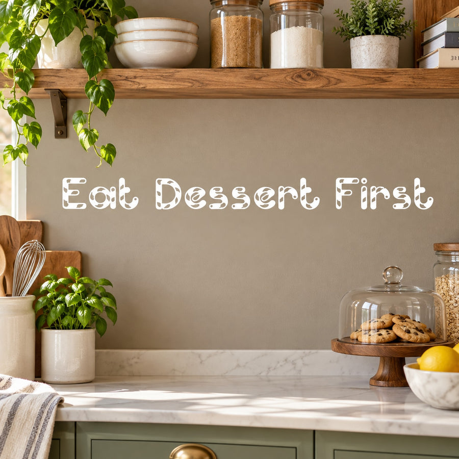 Wall decal with text 'Eat Dessert First' in decorative lettering