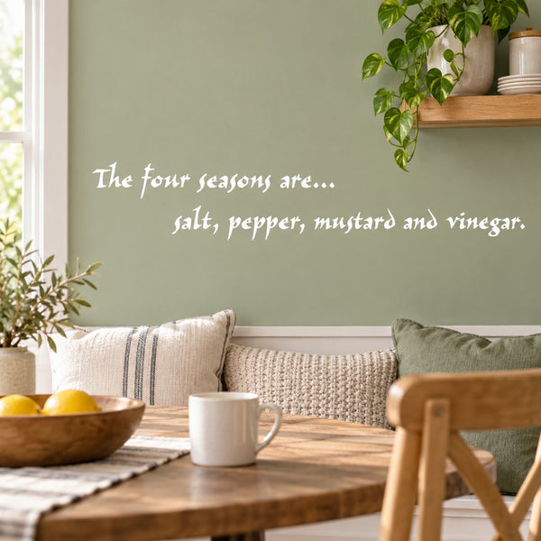 Wall decal with script text: 'The four seasons are... salt, pepper, mustard & vinegar.'