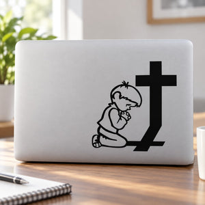 Praying boy and cross decal, black outline illustration