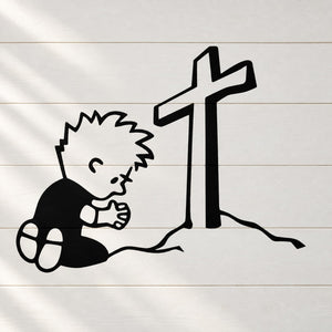 Kneeling boy praying wall decal with large cross and hands clasped, black outline