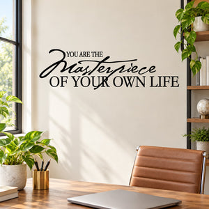 Black cursive quote wall decal: “You are the masterpiece of your own life”