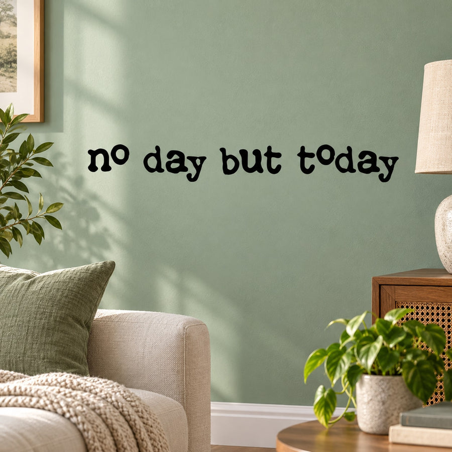 Black wall decal text: 'no day but today'