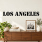 Los Angeles stencil decal, bold black uppercase lettering on light background