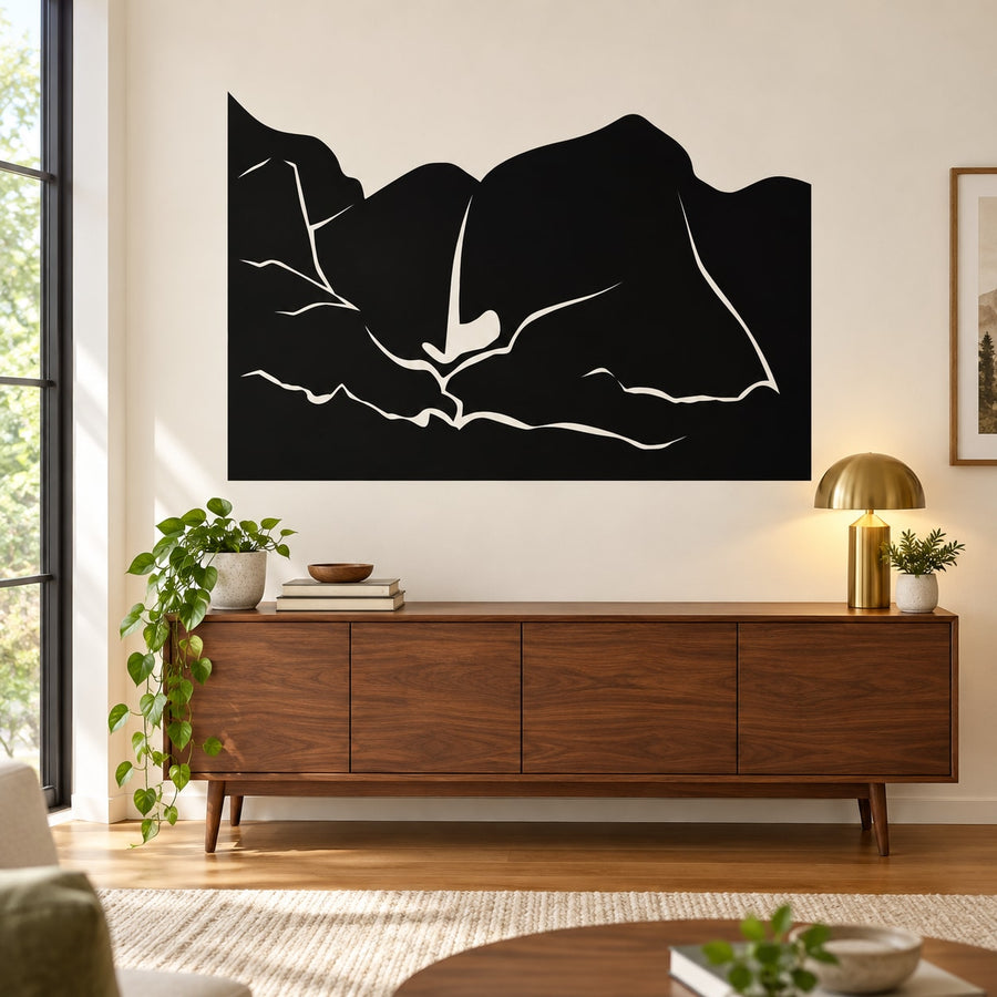 Black waterfall wall decal with flowing ribbon-like silhouette