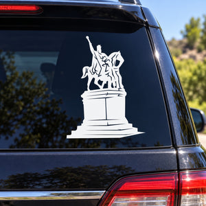 White man on horse statue decal on dark car window