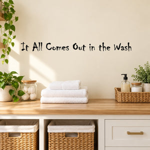 Wall decal with black quote text: “It All Comes Out in the Wash”