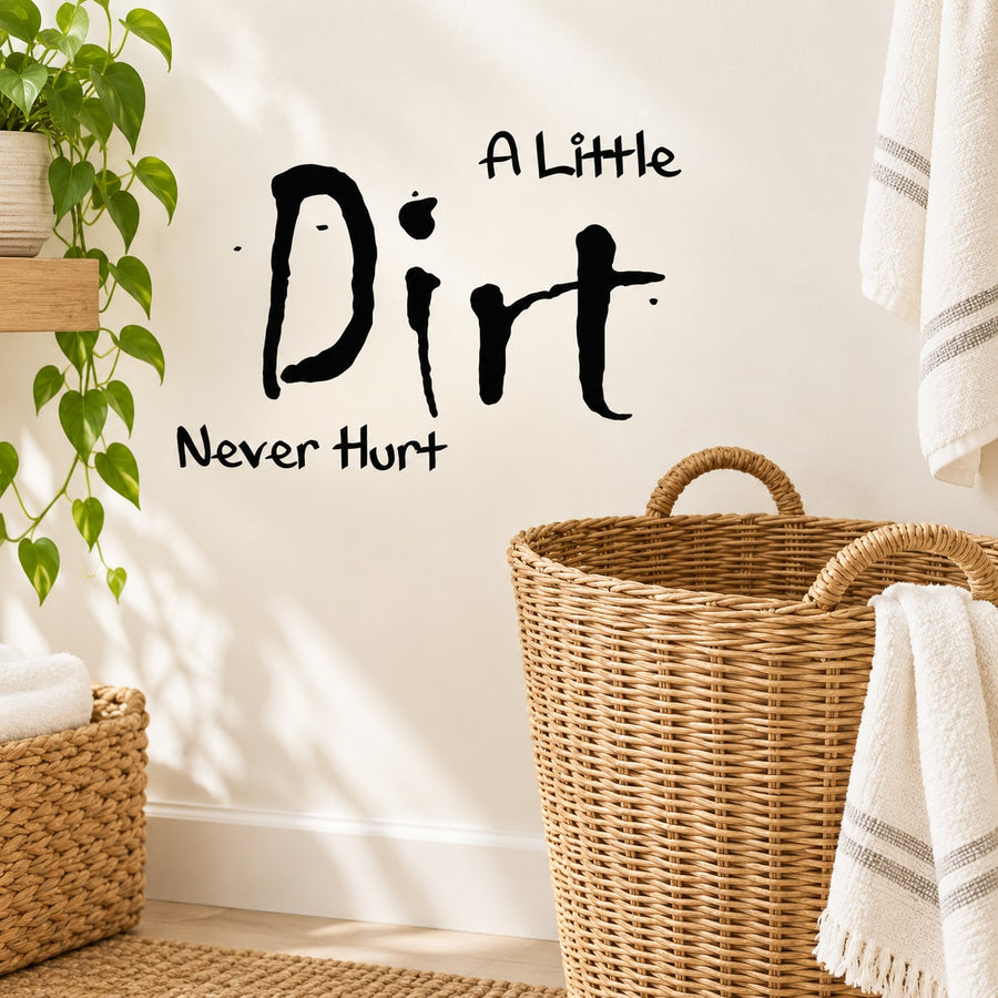 Black wall decal with text 'A Little Dirt Never Hurt'