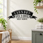 Laundry wall decal reading "Open 24 Hours" and "Self-Serve" on ribbon banner