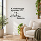 Inspirational wall decal text: 'Knowledge speaks ---' and 'wisdom listens'.