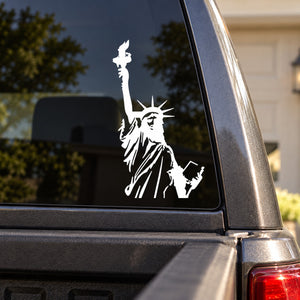 Car window Statue of Liberty half decal, white silhouette on dark glass