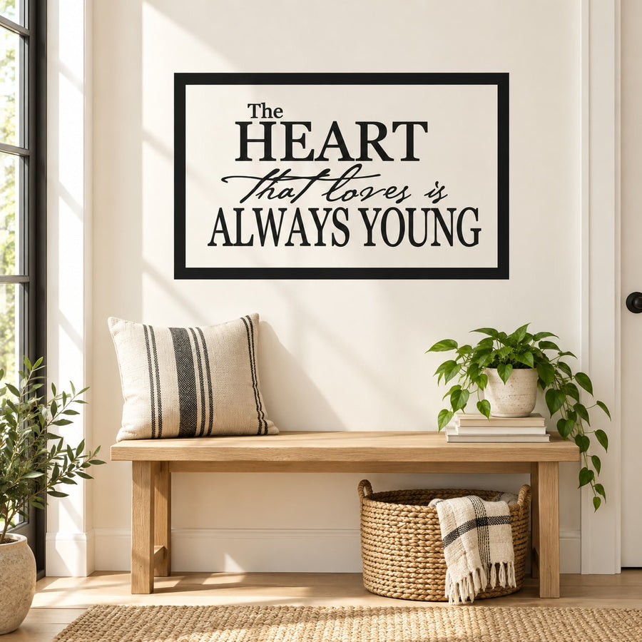The heart that loves is always young Decal — illustrative vinyl decal application mockup. Surrounding objects are not included.