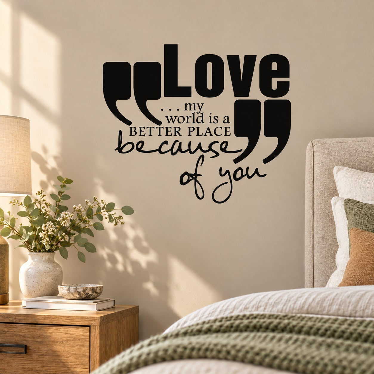 Black wall decal with 'Love ... my world is a better place because of you' quote