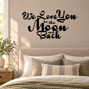 Wall decal with “We Love You to the Moon and Back” lettering