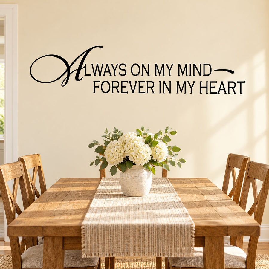 Black wall decal with cursive quote: Always on my mind—Forever in my heart