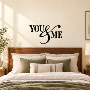Wall decal with black 'YOU & ME' lettering