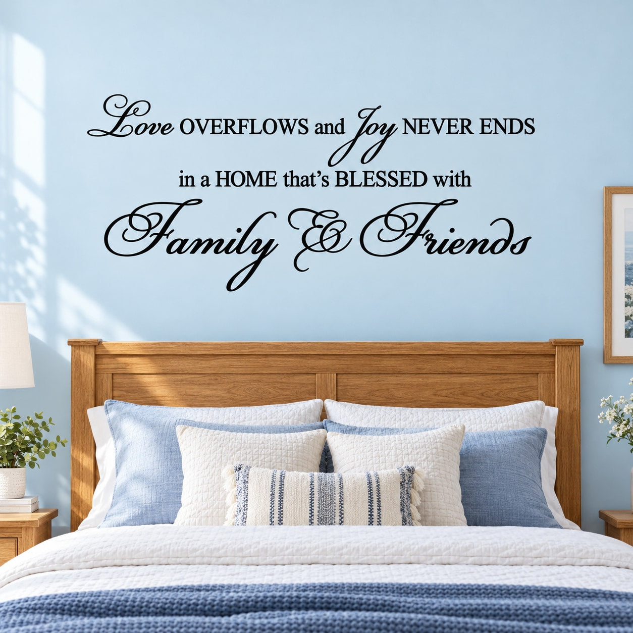 Black script wall decal text: Love overflows and joy never ends, Family & Friends