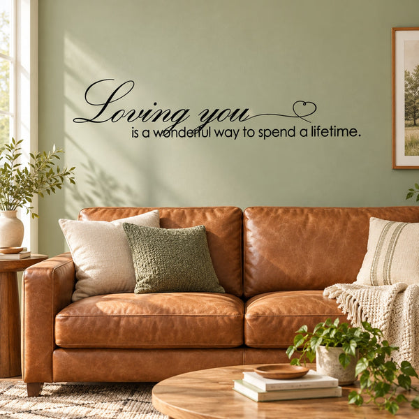 Wall decal cursive quote: 'Loving you' and 'wonderful way to spend a lifetime'.