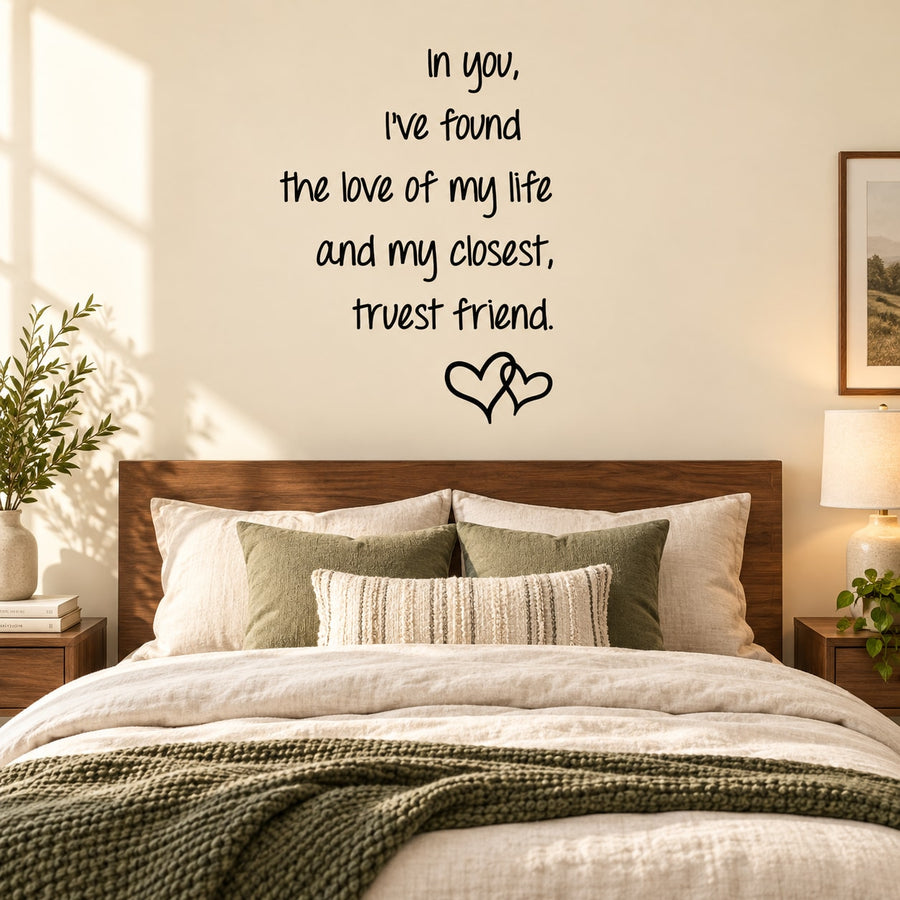 Wall decal with black script text and small heart outline