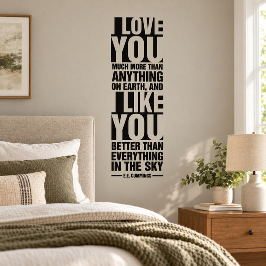 Black typographic wall decal with stacked quote: LOVE YOU much more than anything... E.E. Cummings