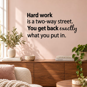 Wall decal with quote text: 'Hard work is a two-way street'.