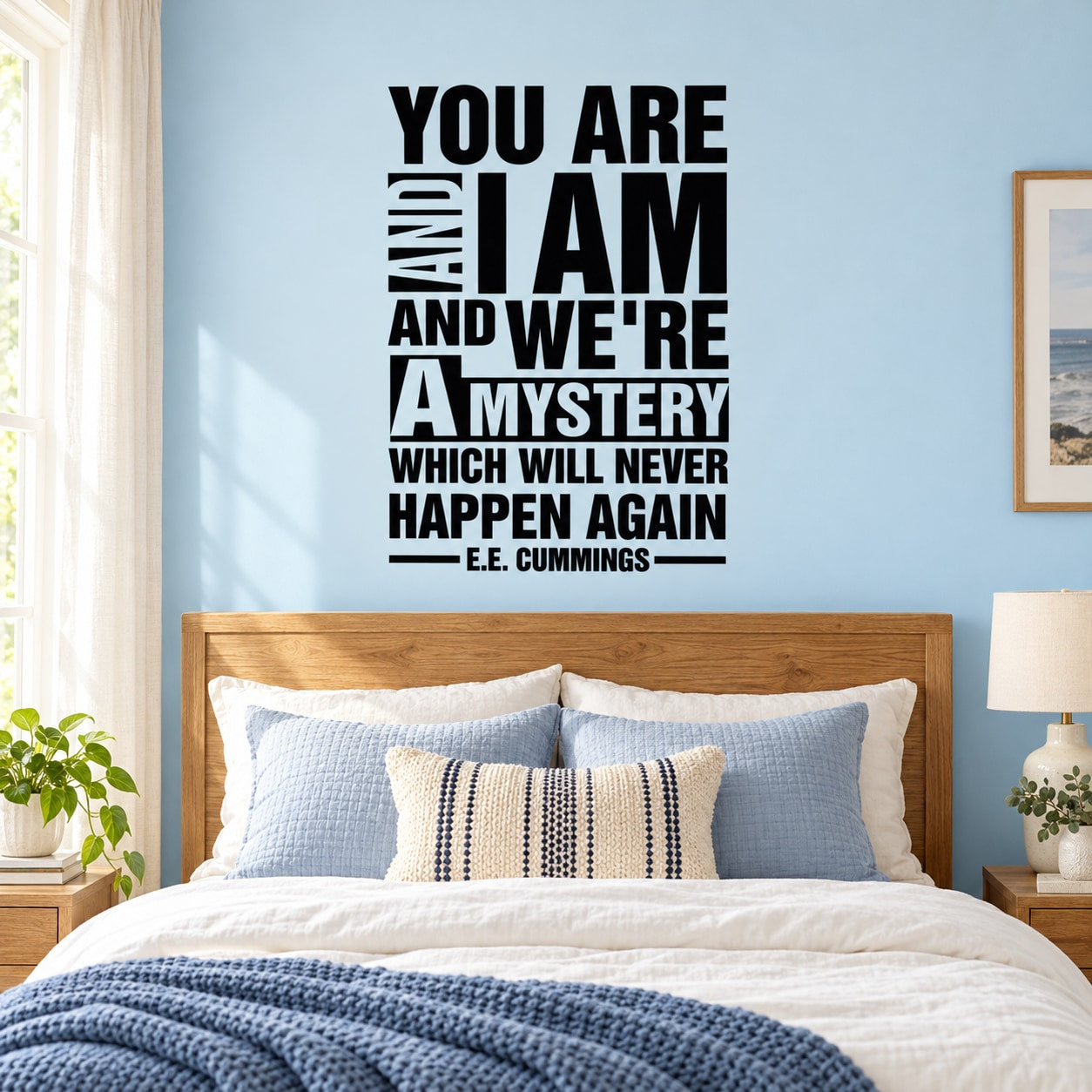 Black wall decal with quote: "You Are and I Am and We're a Mystery"—E.E. Cummings