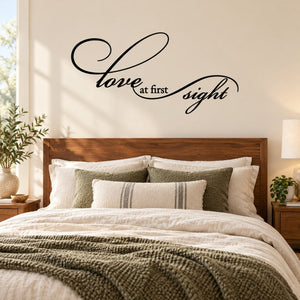 Cursive black wall decal with 'Love at first sight' lettering