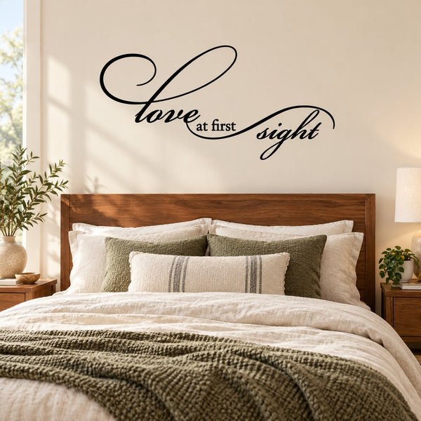 Cursive black wall decal with 'Love at first sight' lettering