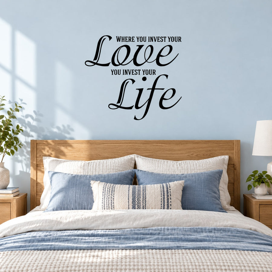 Inspirational wall decal with black script text: “Where you invest your Love, Life”
