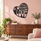 Black heart wall decal with "All you need is love" lettering