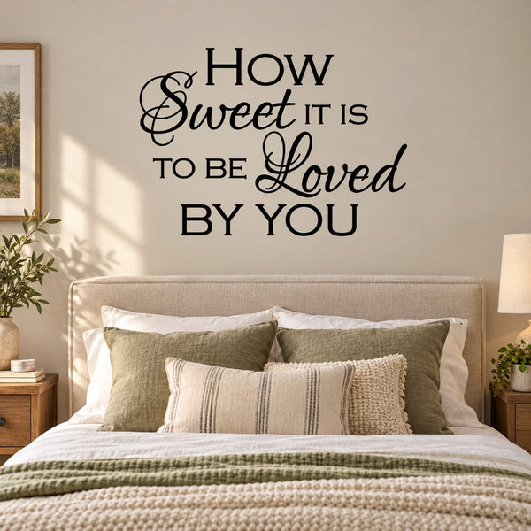 Wall decal text: "How Sweet It Is to Be Loved by You" in black script.