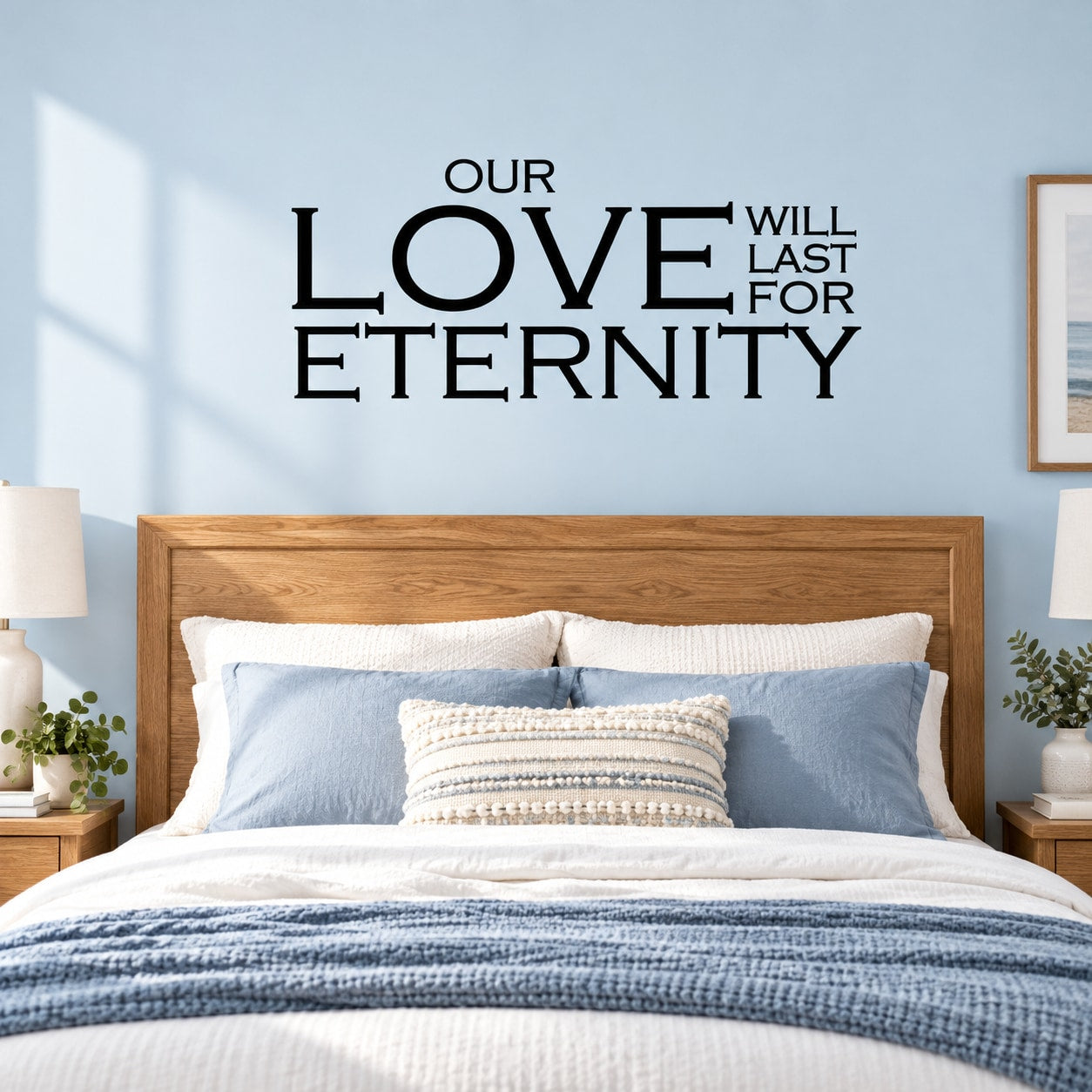 Black wall decal typography reading 'OUR LOVE WILL LAST FOR ETERNITY'