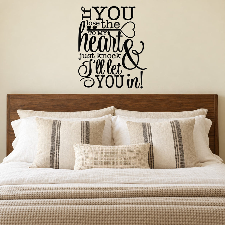 Black wall decal with quote: “If you lose the key to my heart, just knock”