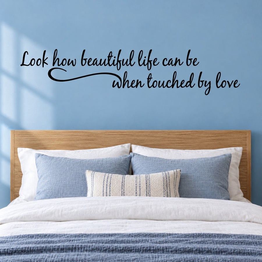 Inspirational wall decal with cursive quote: “Look how beautiful life can be, when touched by love”