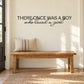 Wall decal text: “There once was a boy who loved a girl” in black lettering