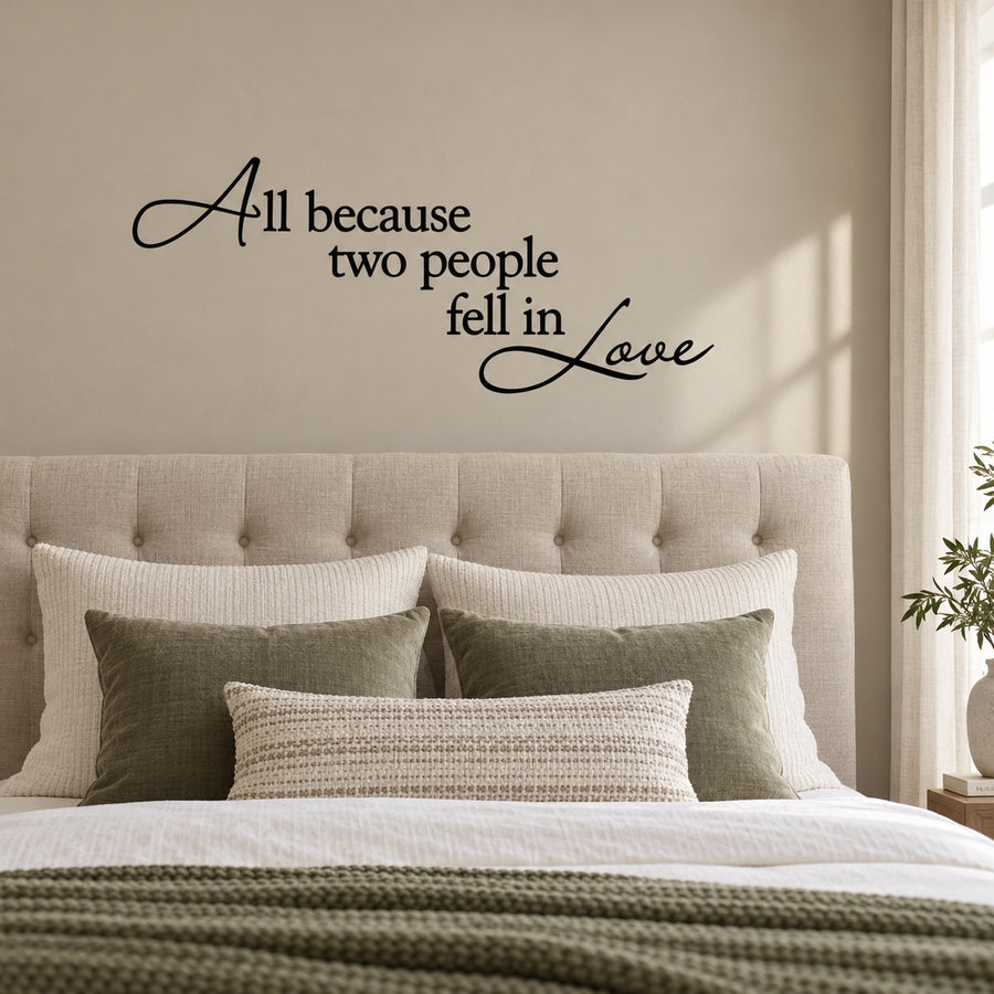 Cursive quote wall decal: “All because two people fell in love”