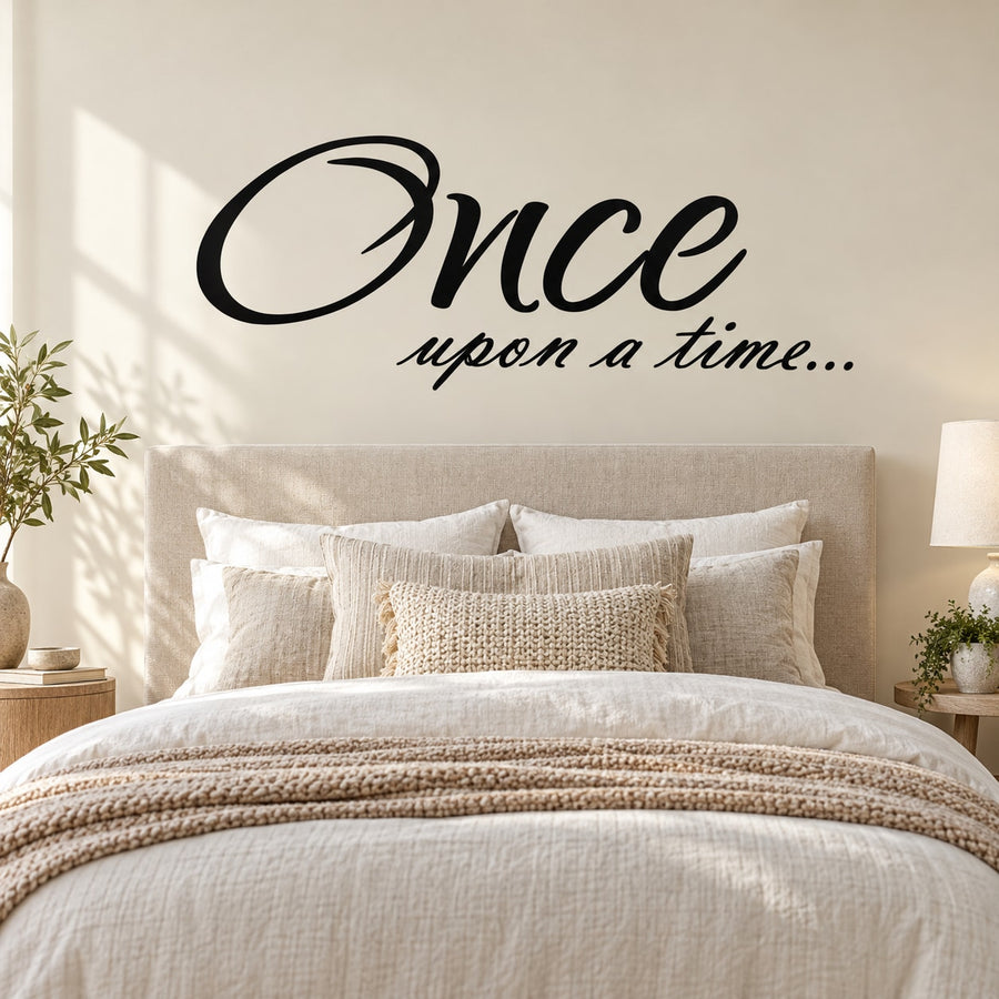 Black wall decal with script text 'Once upon a time...'