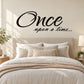Black wall decal with script text 'Once upon a time...'