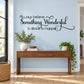Inspirational wall decal with cursive quote, swirled line and heart, dark lettering