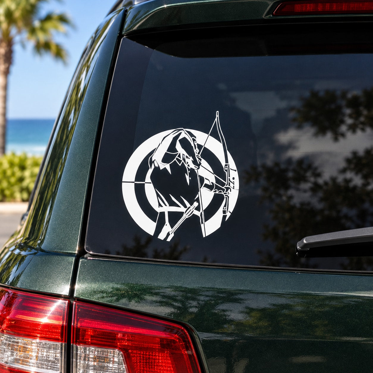 Male archer decal with circular black-and-white archer silhouette on car window