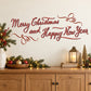 Red cursive Christmas & New Year ribbon quote decal