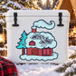 Rectangular cabin sticker with red house, blue outline, tree, and Merry Christmas & Happy New Year.