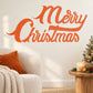 Ribbon-style Merry Christmas wall decal in orange cursive lettering