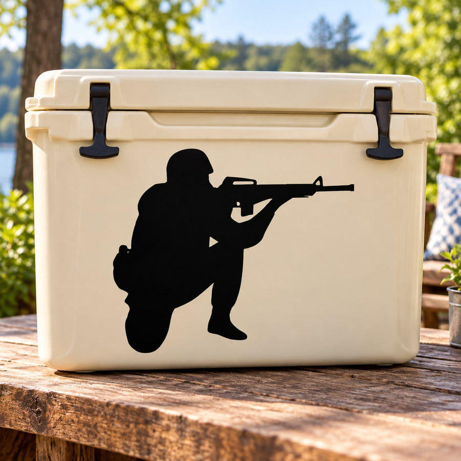 Black soldier aiming rifle decal on light cooler lid
