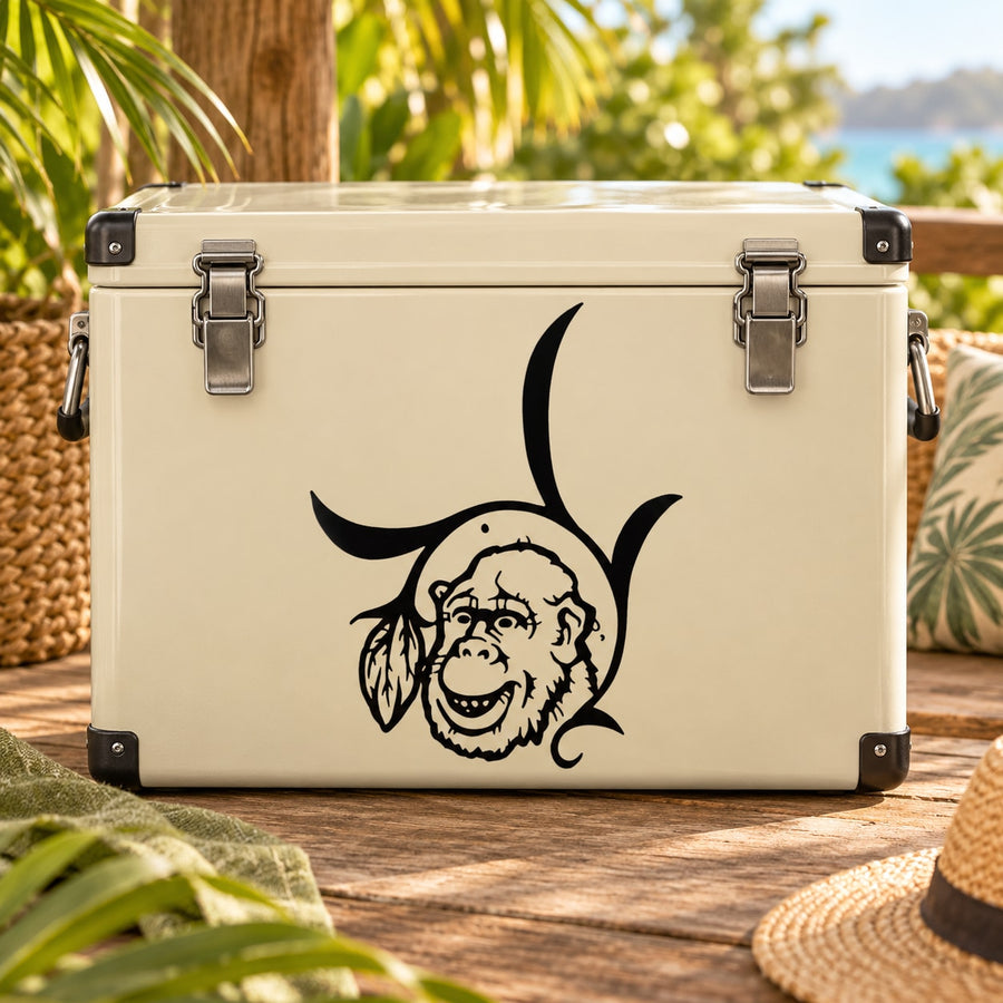 Monkey head decal with black leaf accents on light beige surface