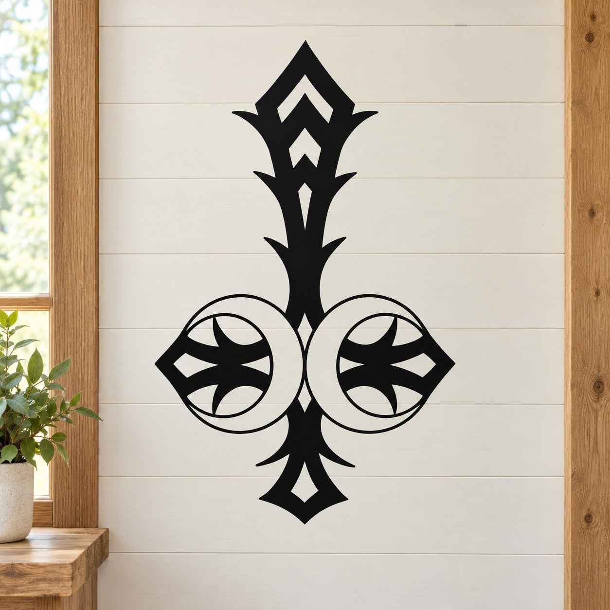Black cross with two moon shapes wall decal sticker
