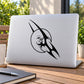 Tribal moon and cat face decal in black on a light laptop lid