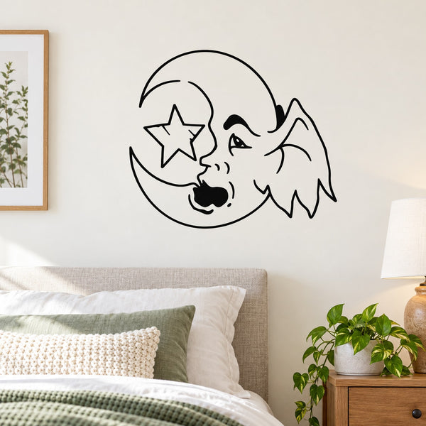 Black line-art gremlin face wall decal on crescent moon with star