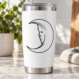 Hollow moon decal with black line-art profile inside a crescent on a white tumbler