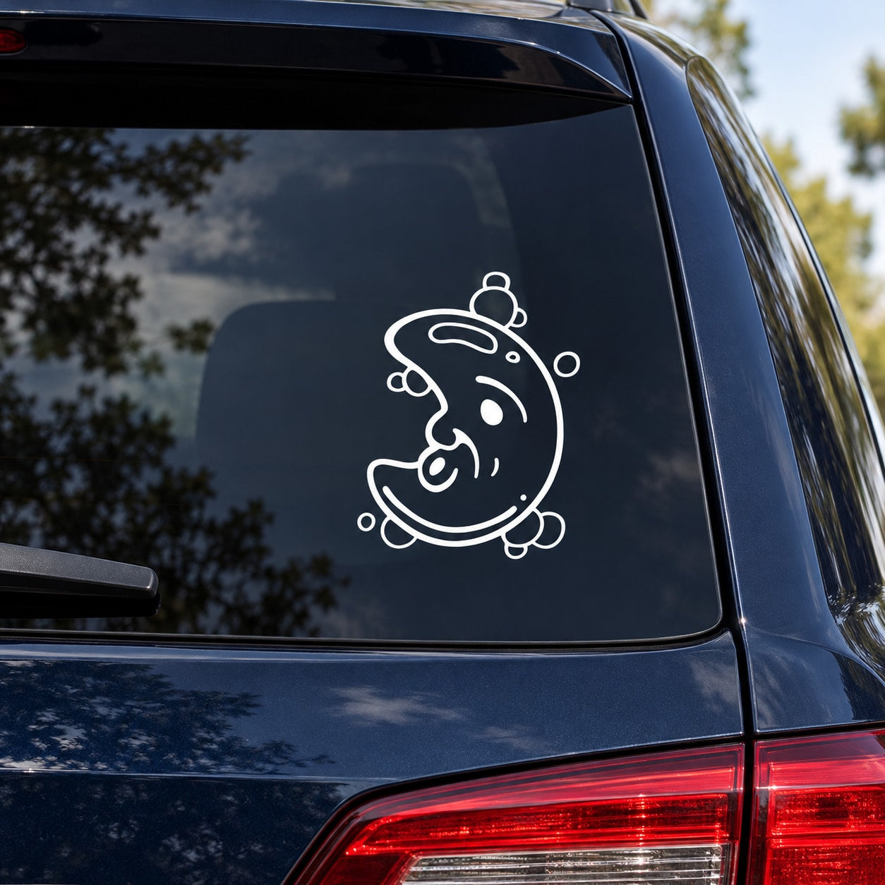 Car window moon and bubble decal in white outline